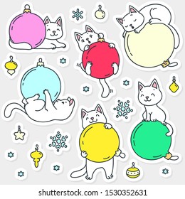 Winter holiday stickers with cats. Doodle illustration of cute white cats playing with chritmas balls. Vector 8 EPS