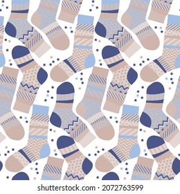 Winter holiday warm socks seamless pattern for background, fabric, textile, wrap, surface, web and print design. Pastel colors vector Xmas rapport. Christmas decorative wrapping paper. 