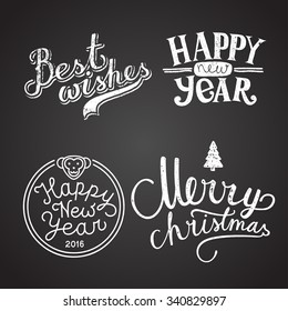 winter holidays calligraphy chalk on board. best wishes. happy new year. merry christmas