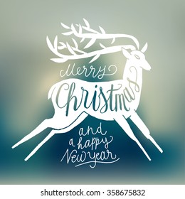 winter holidays deer handwriting. blurred background.
