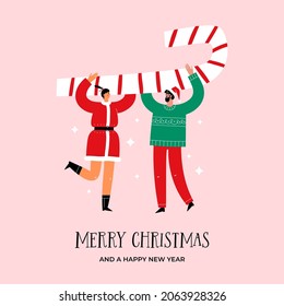 Winter holidays greeting card with happy people carrying big candy cane. Merry Christmas inscription.