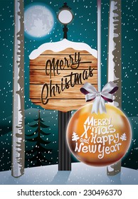 Winter holidays landscape with sign and Christmas ball.
