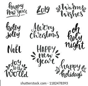 Winter holidays lettering set. Hand written Merry Christmas and happy new year lettering and typography collection. Isolated black on white phrases