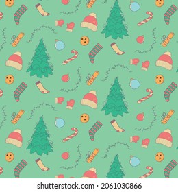 patrón de vacaciones de invierno con mitones, medias, caramelos árbol de navidad sobre fondo de menta