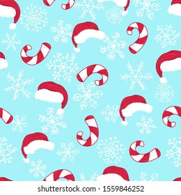 winter holidays seamless pattern with sweet candy cane, santa hats and snowflakes on bright blue background, editable vector illustration for paper, fabric, textile, decoration