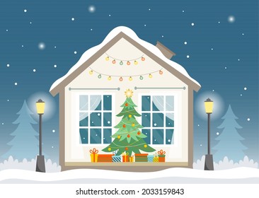 Winter house in cut with christmas tree and presents. Christmas, New year mood. House at winter night on the background of trees, street lights, snowfall. Vector illustration in flat style. 