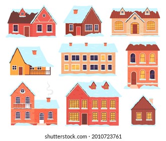 Winter houses. Village, town and rural cottages with snow caps and drifts. Christmas wooden cabin with chimney. Buildings facade vector set. Collection buildings in snow, winter house illustration