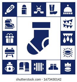 winter icon set. 17 filled winter icons. Included Thermometer, Boots, Gift box, Sock, Buck, Garland, Garlands, Puck, Feeder, Scarf, Hockey, Radiator, Beanie icons