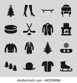 Winter icons set. set of 16 winter filled icons such as pine tree, hat, woman boots, jacket, winter hat, christmas tree, hockey, hockey puck, snowflake, fireplace, skating