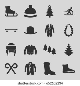 Winter icons set. set of 16 winter filled icons such as pine tree, hat, boot, winter hat, jacket, christmas tree, candy cane, garland, skiing, skating
