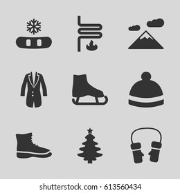 Winter icons set. set of 9 winter filled icons such as winter hat, mittens, jacket, heating system, ice skate, snowflake, Christmas tree, mountain