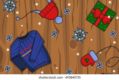 Winter illustration. Winter icons on wooden background.Hat, gloves and pullover