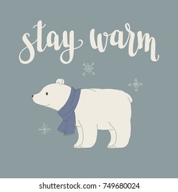 Winter inspired hand lettering with polar bear in a warm scarf. Vector art. 