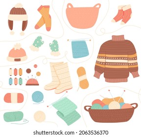 Winter knit clothes. Knitting hobby, wool cloth cardigan sweater. Bundle of knitted winter clothes and outerwear isolated on light background