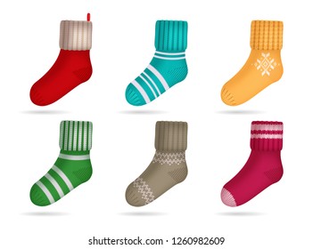 Winter knitted bright colored socks realistic set isolated vector illustration