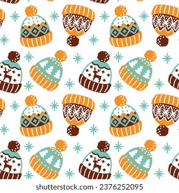 Winter knitted hats. Cute Christmas print. Seamless pattern. Vector.