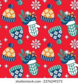 Winter knitted hats and mittens.  Christmas print. Seamless pattern. Vector.