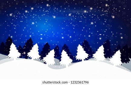 winter landscape of trees against the night sky