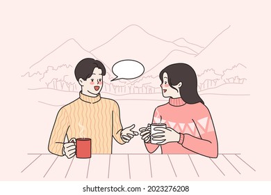 Winter leisure activities and communication concept. Young happy couple man and woman cartoon characters sitting drinking coffee chatting during snowboarding n mountains vector illustration