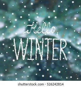 Winter lettering poster called "Hello Winter" on blurred background