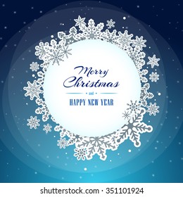 Winter light blue circle frame background with snowflakes