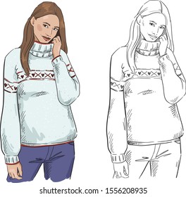 winter look. A woman in warm sweater posing 