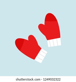 Winter mittens. Red mittens. Blue background. Winter. Vector illustration. EPS 10.