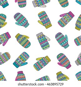 Winter mittens. Vector seamless pattern with hand drawn doodle mittens. Bright colors - pink, yellow, blue, white.
