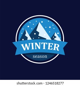 Winter mountain with snowy peak and snowfall in round. Snowy mountain landscape in winter season. Badge for company style or logo