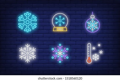 Winter neon sign set with snowflakes, bauble, thermometer, snow globe. Vector illustration in neon style for topics like December holidays, Christmas, snowfall