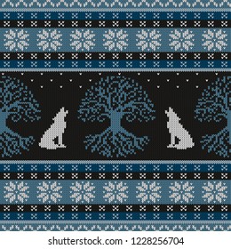 Winter night, Tree of life and howling wolves. Knitted woolen seamless pattern