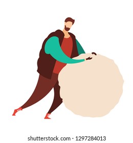 Winter outdoor activity. A young man dressed in outerwear makes a big snowball for a snowman. Flat vector outdoor illustration. Isolated on white background.