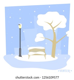 Winter park with a bench, a winter tree and a lantern on the background of the city.