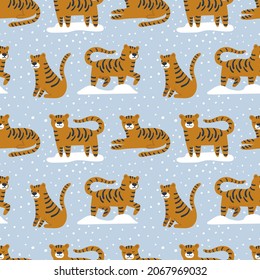 Patrón invernal - tigres lindos. Los niños encantadores tienen un estilo impecable. Animales en la nieve. Objetos repetidos. Diseño de patrones de año nuevo. Bien por el papel textil, envolvente. Diseño de superficie moderno con símbolo de 2022.