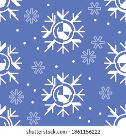 Winter pattern in minimal geometric design with white snowflakes on blue background.