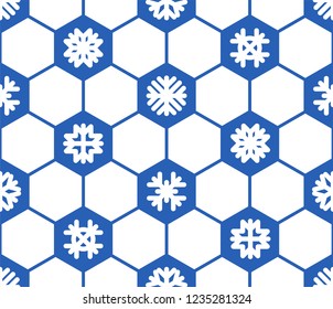 Winter pattern on a football subject with snowflakes. Seamless background. The vector model with blue and white elements.