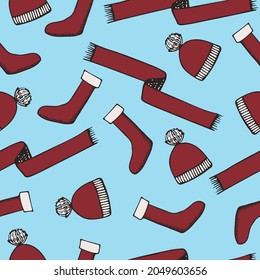 Patrón invernal con bufandas y botas, patrón brillante con elementos doodle, textura de color rojo y azul, navidad sin costura, fondo de año nuevo, patrón de doodle navideño