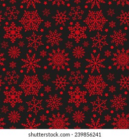 Winter pattern with snowflakes on a black and red background. Vector, seamless texture