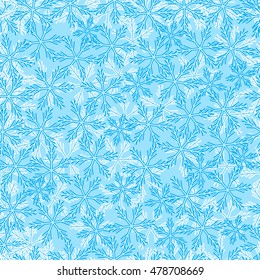 Winter pattern with variety of snowflakes on a light background.
