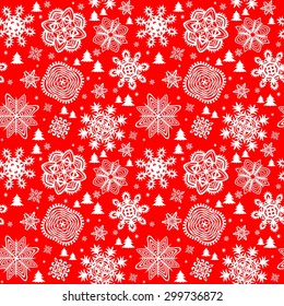 Winter red background with paper snowflakes and firs