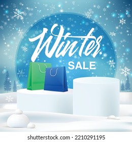 Winter sale concept - shopping bags on product podium with falling snow background.