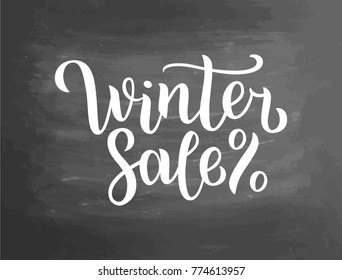 Winter sale lettering on blackboard. Winter sale text lettering for invitation and greeting card, prints and posters. Hand drawn typographic inscriptions. Vector illustration