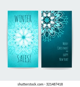 Winter sales. Happy new year and merry Christmas. Two vector artwork for web banner, leaflets, greeting cards and new year greetings.Snowflake on dark and light blue background.Mandala.