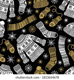 Winter seamless hand drawn pattern with sweather, hat, mittens, socks and snowflakes. Christmas ornament. Vector illustration.