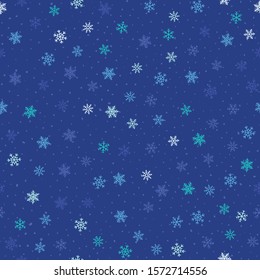Winter seamless pattern. Blue Christmas and New Year background with small scattered snowflakes, dots. Elegant repeat vector texture. Festive winter holiday theme. Illustration on snowfall, blizzard