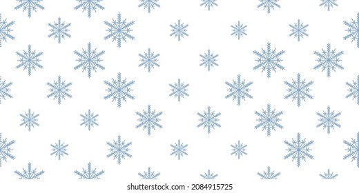 Patrón invernal sin fisuras con copos de nieve azules sobre fondo blanco. Ilustración vectorial para tela, papel de pared textil, carteles, papel de envoltura de regalo. Ilustración vectorial de Navidad. Cae la nieve.