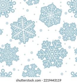 Winter seamless pattern from blue snowflakes. Vector illustration. Endless texture.