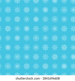 Winter seamless pattern in blue tones with different snowflakes for Christmas and New Year festive decor. Vector illustration