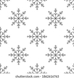 Winter seamless pattern with cartoon hand drawn snowflakes on white background. New Year backdrop. Vector Christmas background for fabric, textile, wrapping paper, card, invitation, wallpaper.