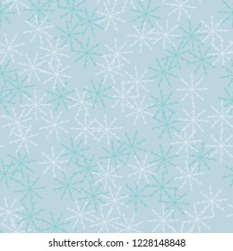 Winter seamless pattern with chaotic snowflakes in different shades of blue color. Light Christmas repeat backdrop using for cards, wallpapers, scrapbooking, print, gift wrap, UFO camouflage etc.